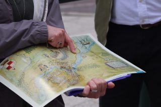 Photo of a facsimile map of the Donegal region with the area of Ballyshannon being pointed to