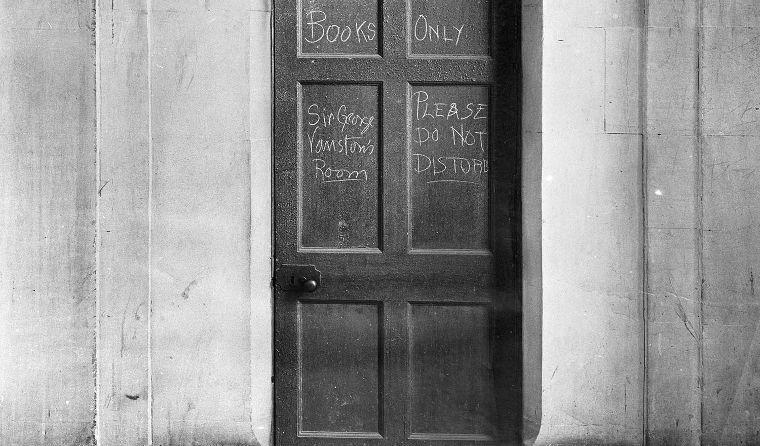 Graffiti on a door in the Custom House recorded following it’s destruction on 25 May 1921. ©Photographic Archive, National Monuments Service, Government of Ireland.