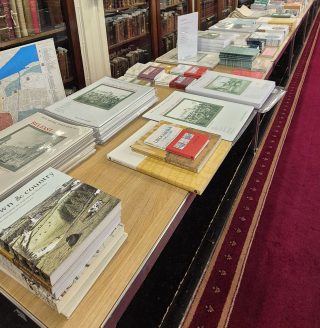 Photograph of numerous RIA publications laid out on tables in the Meeting Room of the Royal Irish Academy